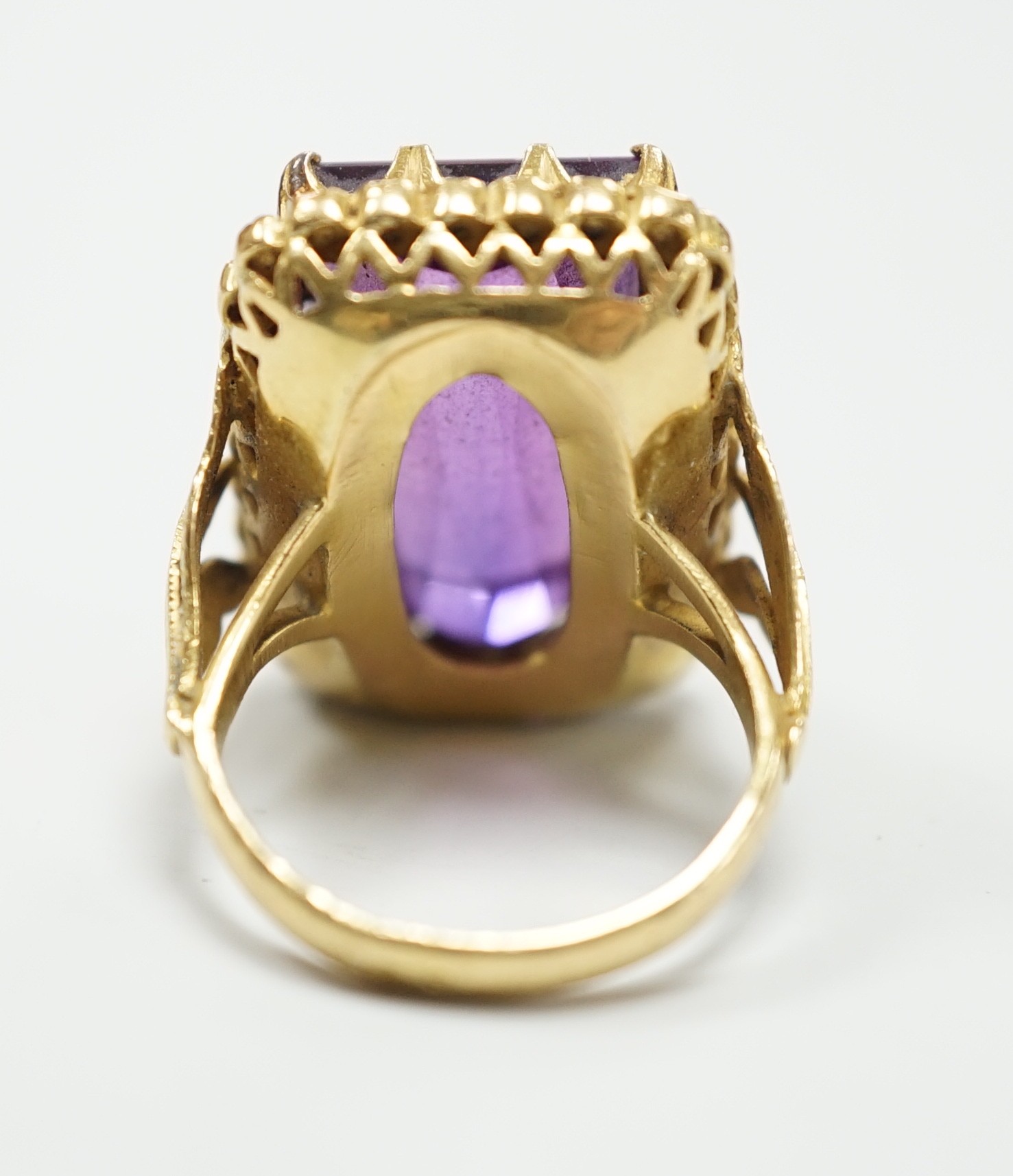 A Portuguese? yellow metal (stamped 800) and rectangular cut synthetic colour change corundum set dress ring, with diamond chip set border, size M, gross weight 13 grams.